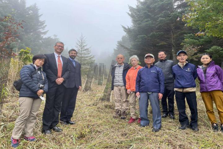 Mr. Mayank Joshi, Professor Singh, OISCA Senior Management, and staff in charge of the reforestation project.